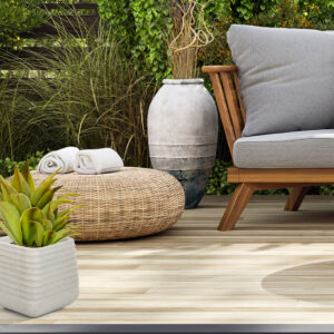 Cozy patio area with garden furniture, sliding doors and decking